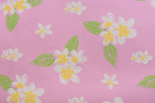 White flowers on pink paper