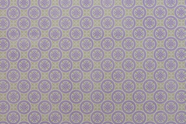 Purple and tan circles on cream paper